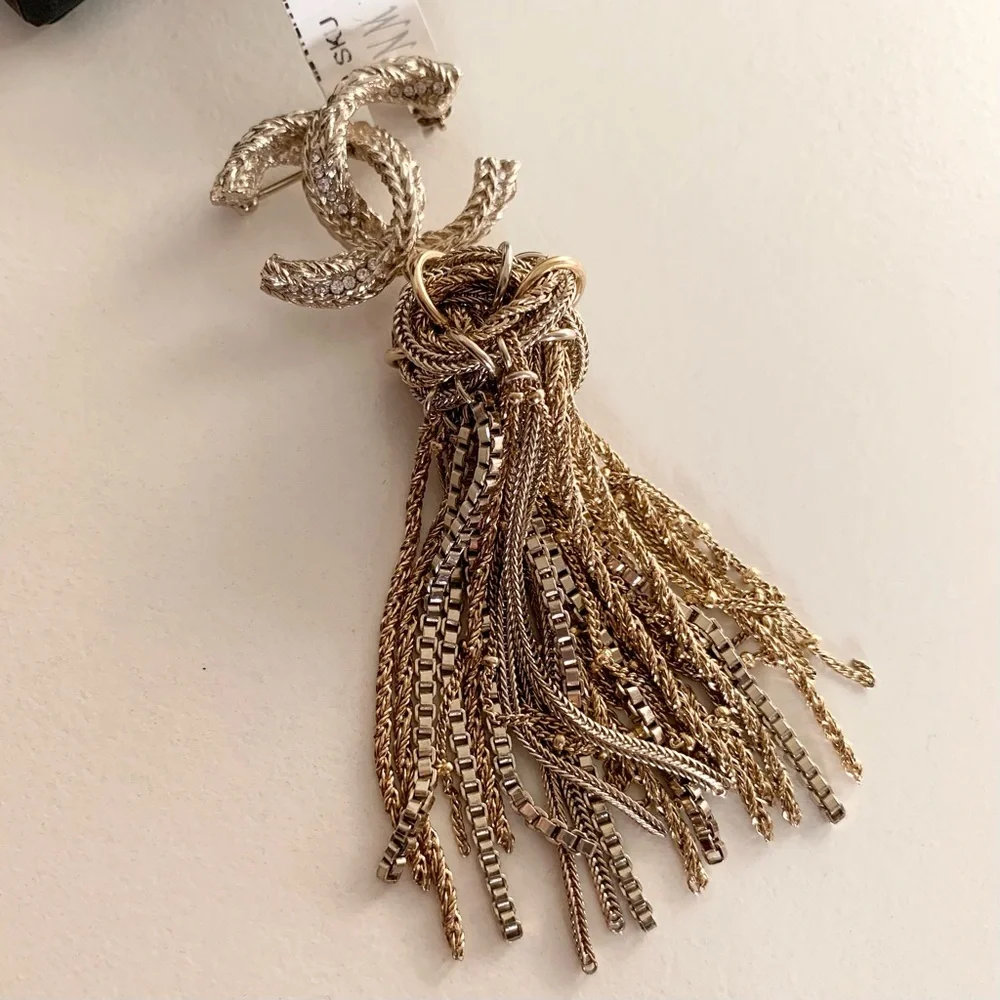 Chanel large tassel brooch in gold with crystals